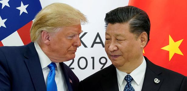 29.jun.2019 - O presidente americano Donald Trump e o presidente chinês Xi Jinping no Japão