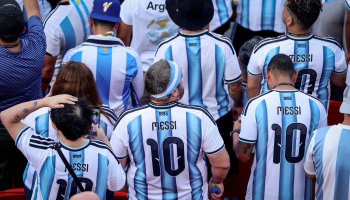Torcedores no Estádio do Kansas com a camisa da seleção argentina
             -       
        Siphiwe Sibeko/Reuters