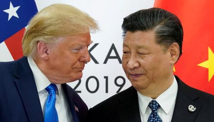 29.jun.2019 - O presidente americano Donald Trump e o presidente chinês Xi Jinping no Japão