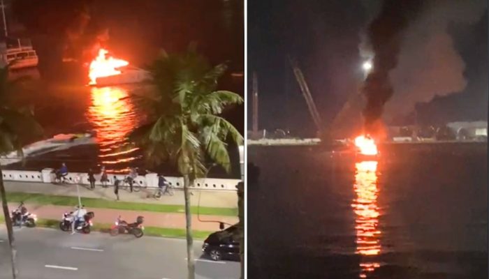 1 de 2Lancha pega fogo no Canal do Estuário em Santos (SP) — Foto: Reprodução